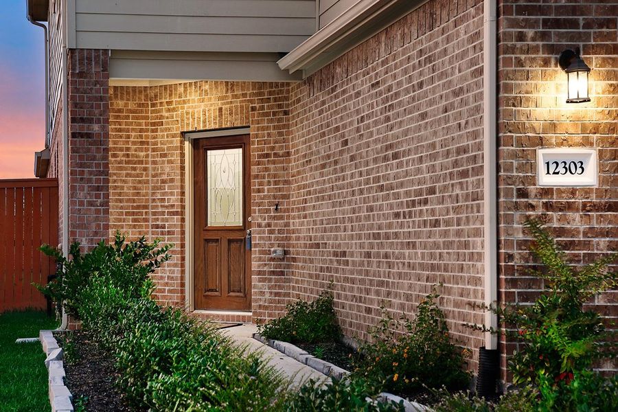 Front exterior of a new home in Balmoral East, Humble, TX, highlighting curb appeal (Image 4).