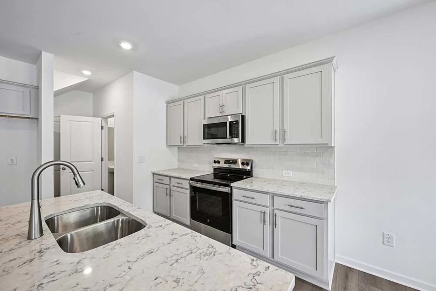 Kitchen featuring Milan Collection Finishes