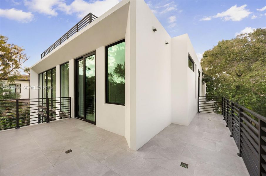 Exterior details and patio area of a home in , South Miami (Image 3).