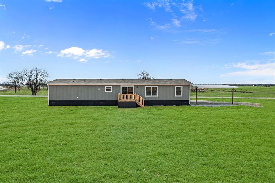 Exterior details and patio area of a home in , Poolville (Image 2).