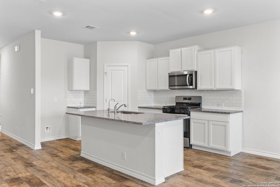 Furnished interior view inside a new home in Brookstone Creek, San Antonio (Image 7).