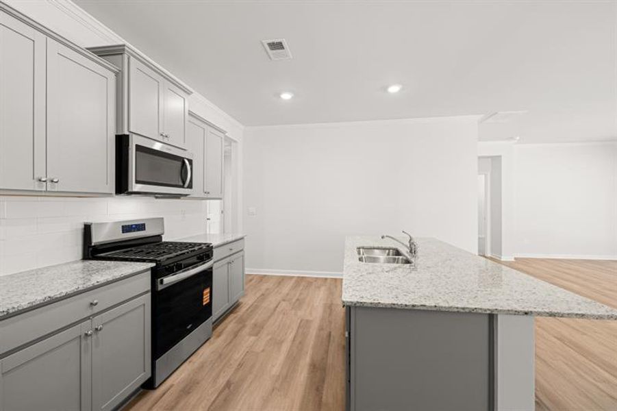 Furnished interior view inside a new home in Northwoods at Mirror Lake, Villa Rica (Image 10).