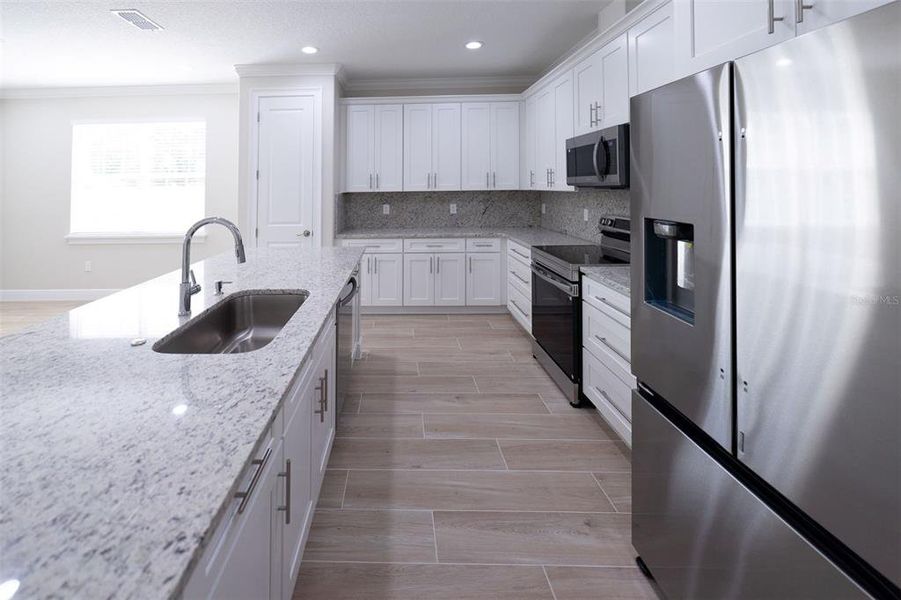 Furnished interior view inside a new home in , Summerfield (Image 6).