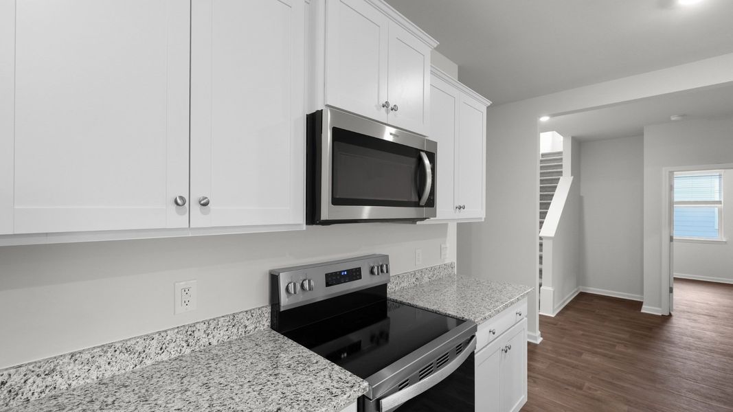 Representative furnished interior of a home built from the ARCHER-EXP by D.R. Horton in Hillcrest, Ravenel (Image 9).