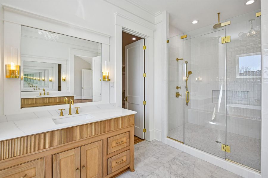 This huge shower is centered on the opposite wall of the bathroom. This huge shower is centered on the opposite wall of the bathroom.