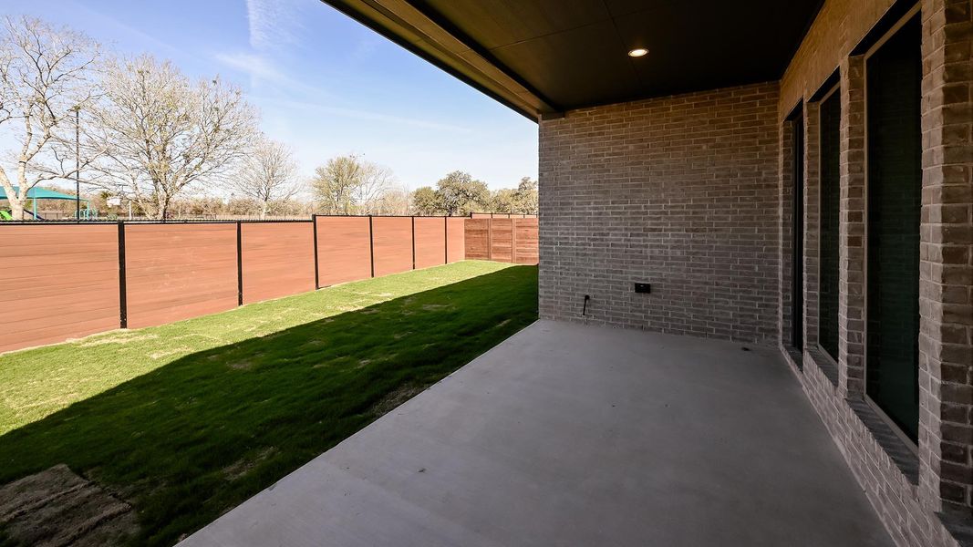 Exterior details and patio area of a home in Juniper Springs, Lockhart (Image 22).