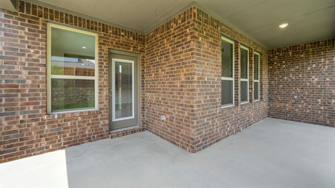 Exterior details and patio area of a home in Silverado, Aubrey (Image 2). Exterior details and patio area of a home in Silverado, Aubrey (Image 2).