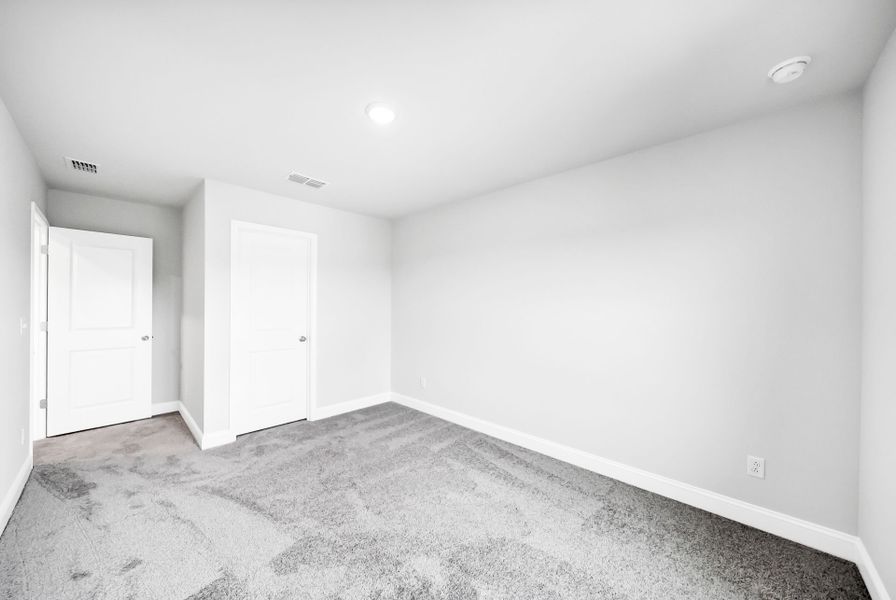 Spacious, unfurnished interior of a new home in Monroe Preserve, Chapin (Image 32).