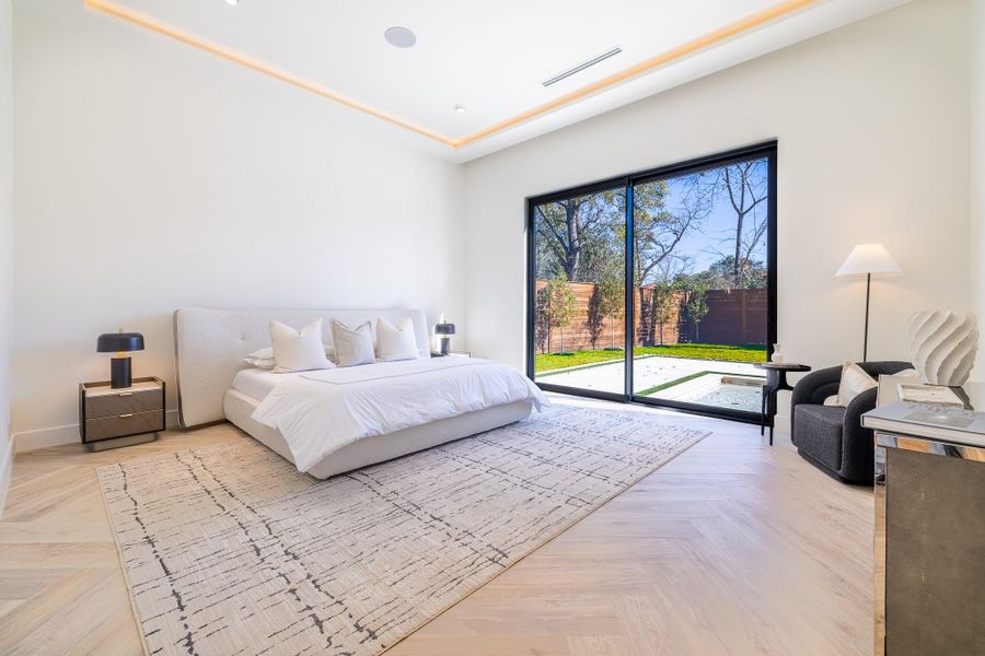 Alternate view of the primary suite highlighting ceiling detail. Alternate view of the primary suite highlighting ceiling detail.