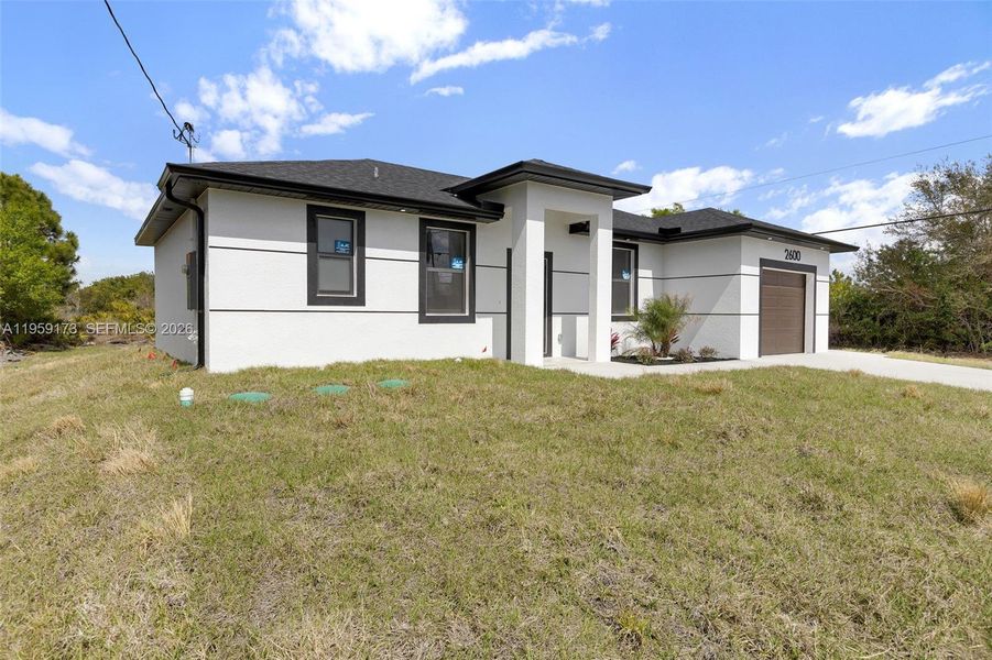 Exterior details and patio area of a home in , Lehigh Acres (Image 29).