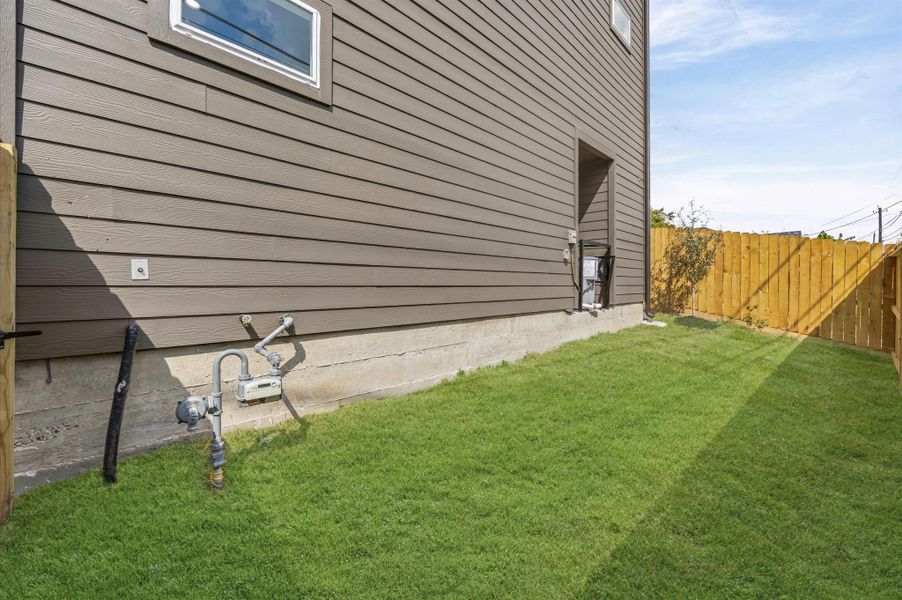 Exterior details and patio area of a home in , Houston (Image 2). Exterior details and patio area of a home in , Houston (Image 2).