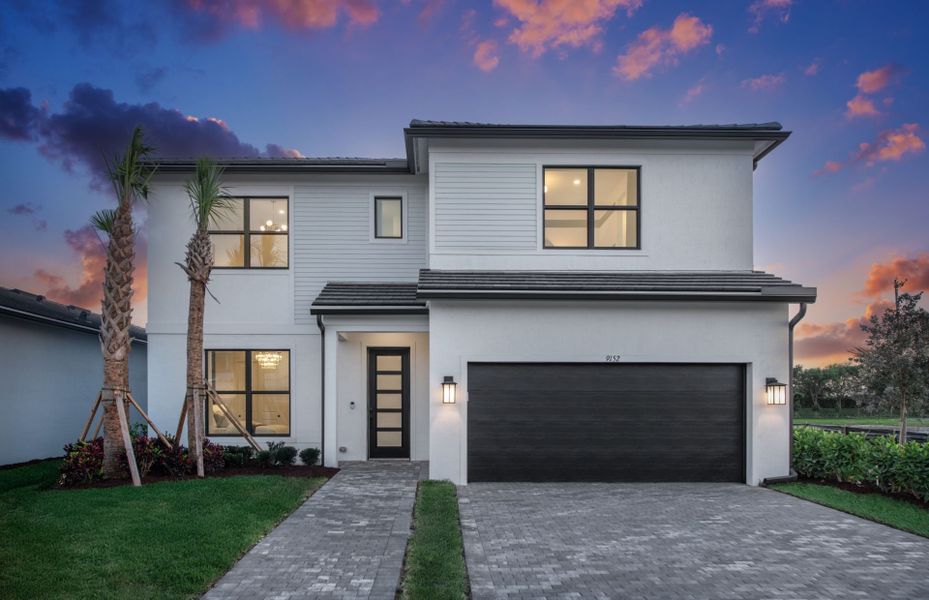 Front exterior of a new home in Greyhawk Landing, Lake Worth, FL, highlighting curb appeal (Image 1).