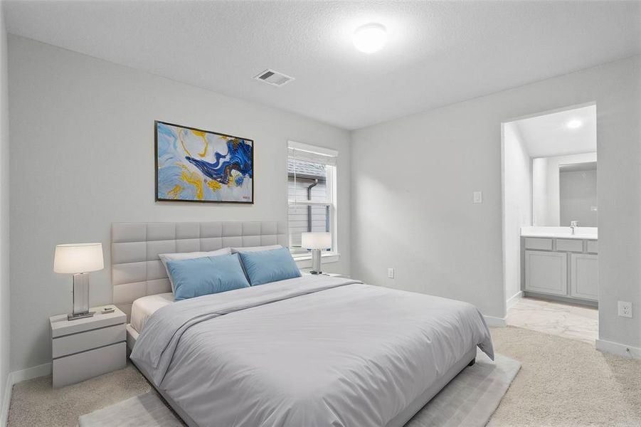 Secondary bedroom features plush carpet, custom paint, high ceilings, large window with privacy blinds and access to its own private vanity shared club bath.