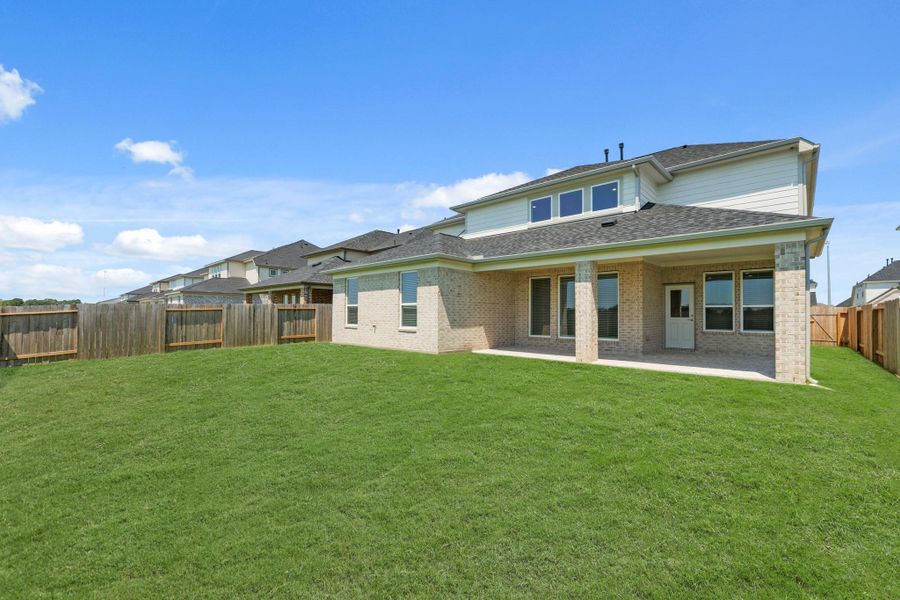 Front exterior of a new home in Briarwood Crossing, Rosenberg, TX, highlighting curb appeal (Image 21).