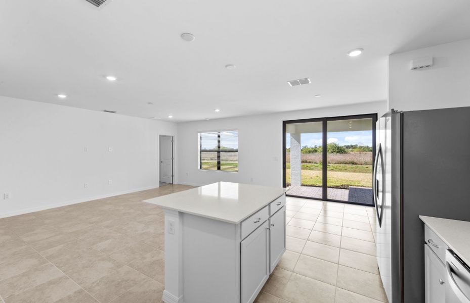 Furnished interior view inside a new home in Whispering Lakes, Lehigh Acres (Image 8).