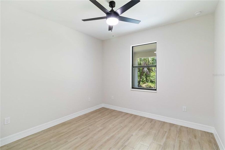 Spacious, unfurnished interior of a new home in , Port Charlotte (Image 11).
