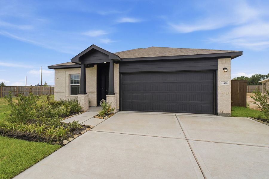 Front exterior of a new home in Harvest Pointe, Needville, TX, highlighting curb appeal (Image 26).