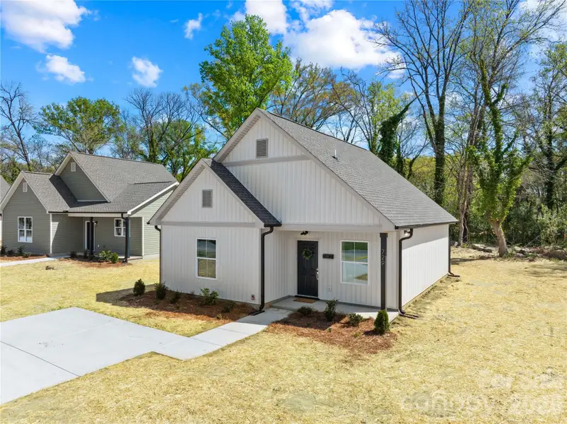 Front exterior of a new home in , Rock Hill, SC, highlighting curb appeal (Image 24).
