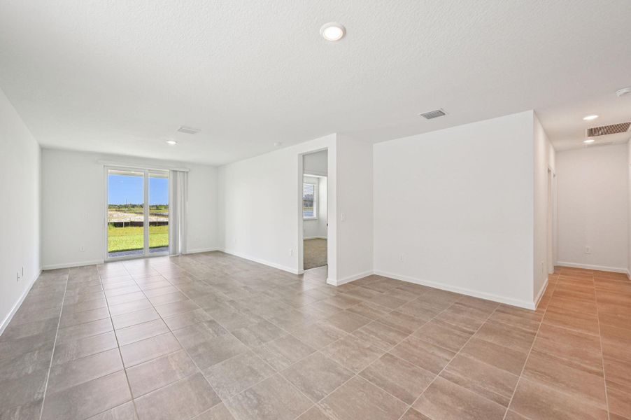 Furnished interior view inside a new home in Hampton Park - Classic Series, Vero Beach (Image 13). Furnished interior view inside a new home in Hampton Park - Classic Series, Vero Beach (Image 13).