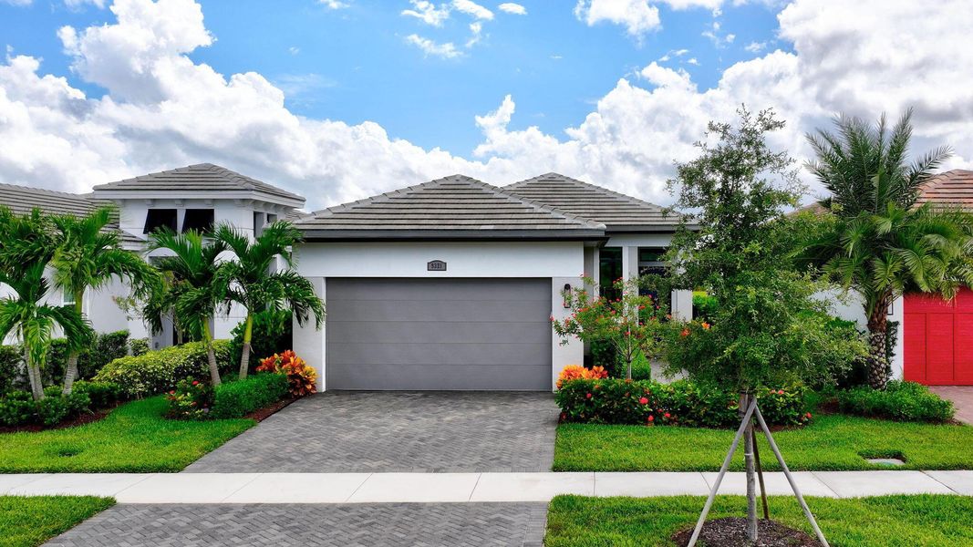 Front exterior of a new home in , Port St. Lucie, FL, highlighting curb appeal (Image 29).
