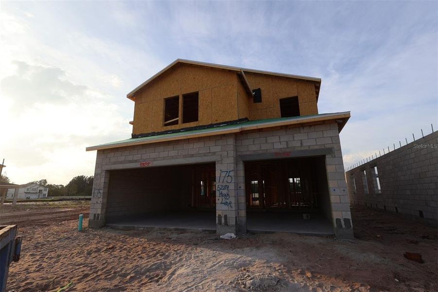 In-progress construction of a new home in Center Lake on the Park, St. Cloud, FL (Image 8).