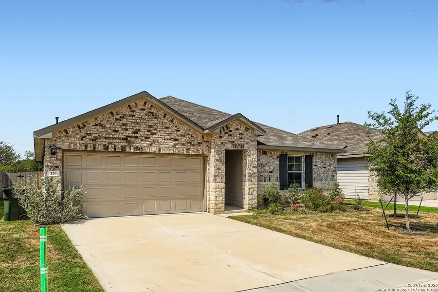 Front exterior of a new home in , New Braunfels, TX, highlighting curb appeal (Image 17). Front exterior of a new home in , New Braunfels, TX, highlighting curb appeal (Image 17).