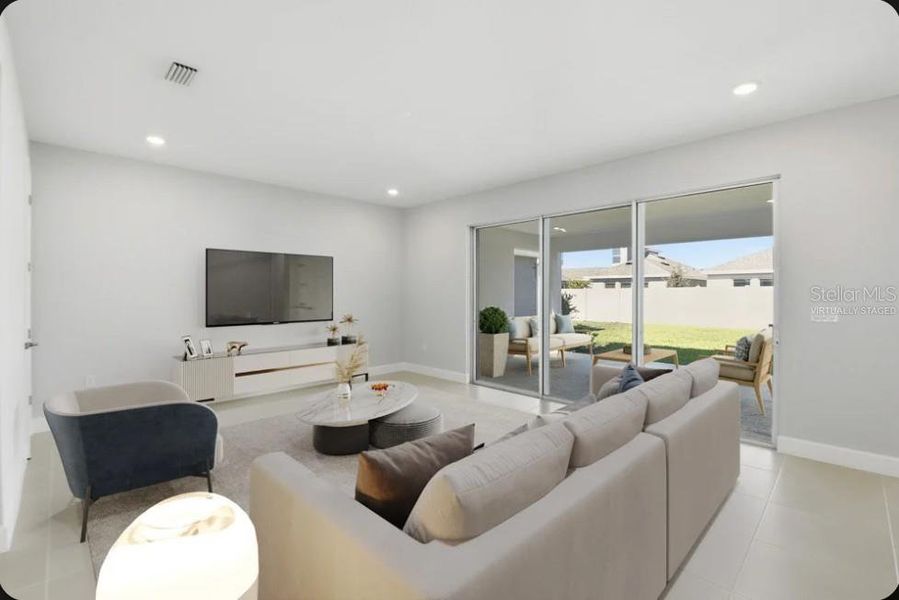 Furnished interior view inside a new home in Harvest at Ovation, Winter Garden (Image 4). Furnished interior view inside a new home in Harvest at Ovation, Winter Garden (Image 4).