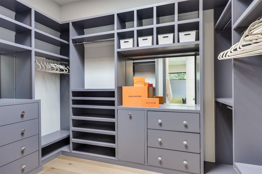 Built-in cabinetry and its own skylight make getting ready the best part of your morning—and yes, there’s the laundry chute for ultimate convenience