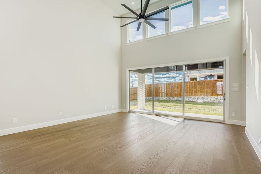 Light-Filled Living Room with Backyard Views| Plan 1581 | Representative Photo