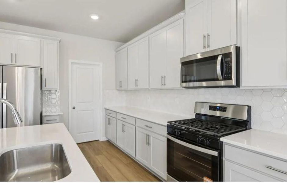 Furnished interior view inside a new home in Harmony Manor, Fairburn (Image 5).