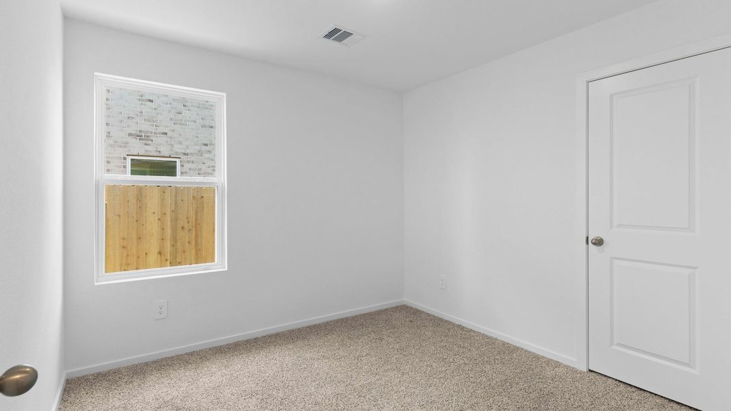 Representative unfurnished interior of a home built from the ESTERO by D.R. Horton in Canterra Creek 45' and 50' Homesites, Iowa Colony (Image 16).