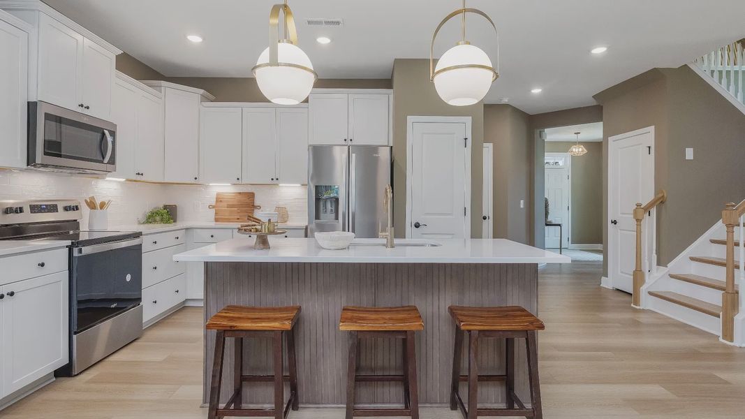 Furnished interior view inside a new home in Sidney Creek Single Family, Zebulon (Image 17).