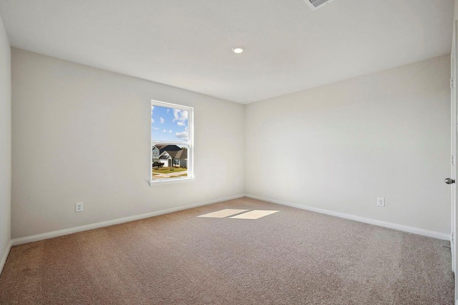 Spacious, unfurnished interior of a new home in Trails at Cochran Ranch, Waller (Image 16).