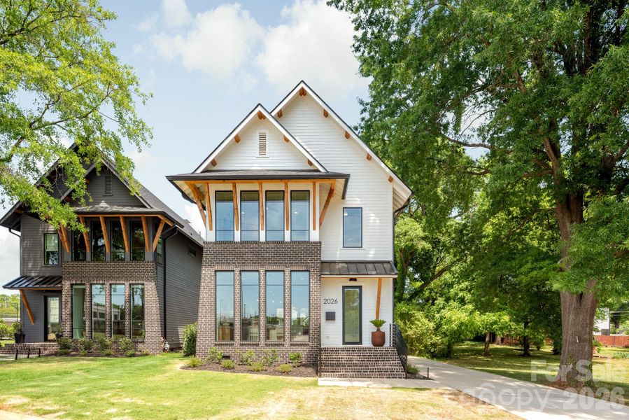 Front exterior of a new home in , Charlotte, NC, highlighting curb appeal (Image 25).