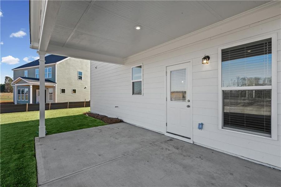 Exterior details and patio area of a home in Creekside at Skelton, Jefferson (Image 3).