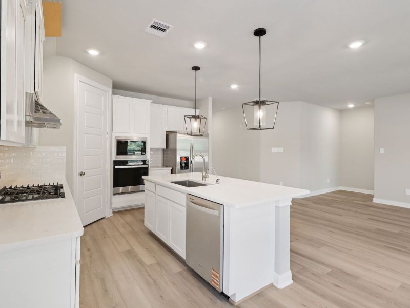 Furnished interior view inside a new home in Sanford Farms - Classic Series, Waller (Image 4). Furnished interior view inside a new home in Sanford Farms - Classic Series, Waller (Image 4).