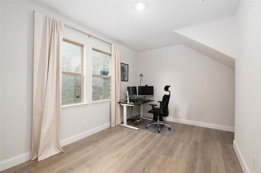 Whether working remotely or managing daily tasks, this dedicated home office offers a quiet and productive workspace tucked away from the main living areas. Whether working remotely or managing daily tasks, this dedicated home office offers a quiet and productive workspace tucked away from the main living areas.