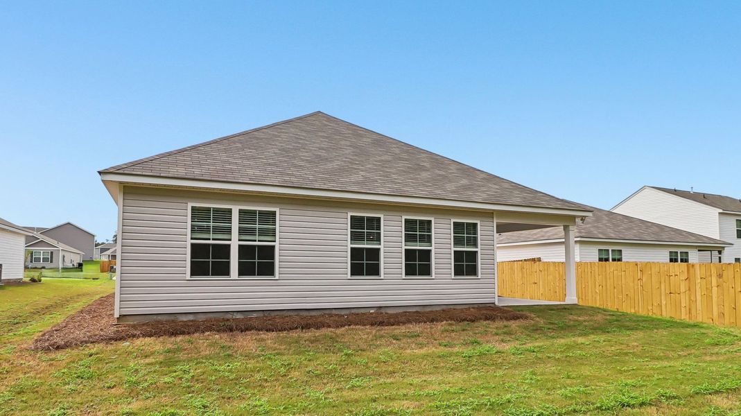 Exterior details and patio area of a home in Gates Village, Lugoff (Image 4).