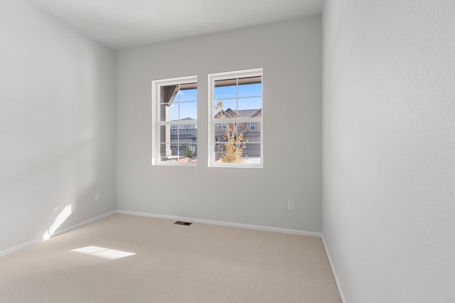 Spacious, unfurnished interior of a new home in The Manors Collection at Golden Overlook, Lakewood (Image 14).
