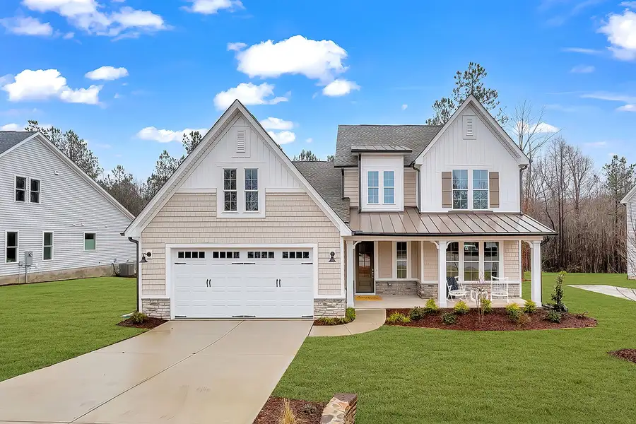 Representative exterior photo of a completed home built from the The Chandler by RobuckHomes in Baylee Ridge, Selma, NC (Image 45). Representative exterior photo of a completed home built from the The Chandler by RobuckHomes in Baylee Ridge, Selma, NC (Image 45).