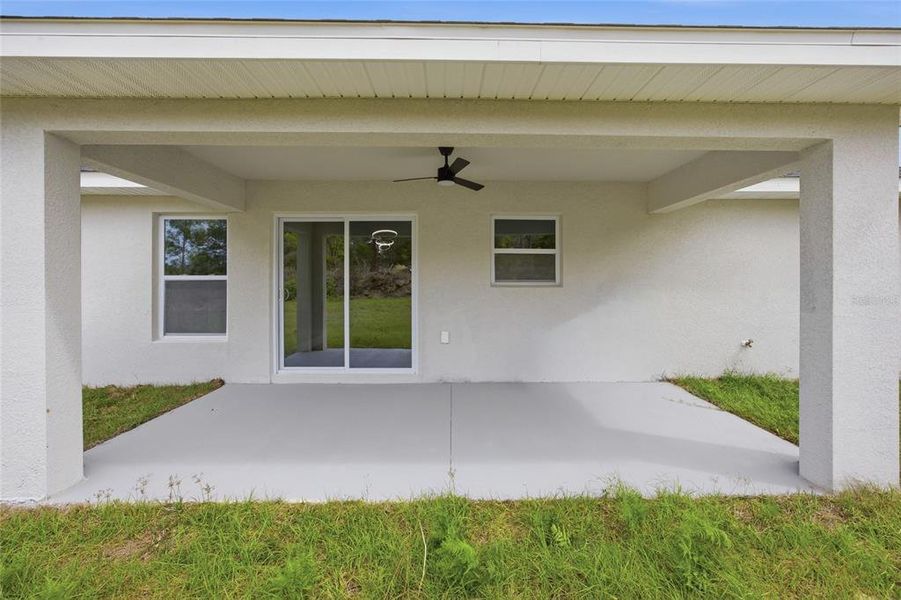 Exterior details and patio area of a home in , Citrus Springs (Image 18).