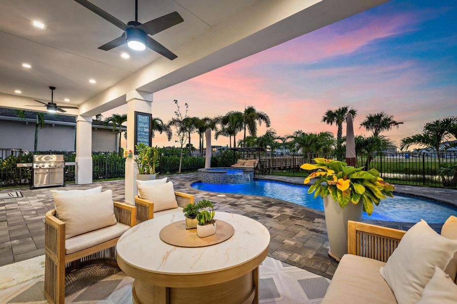 Large 34'8'' x 9'4'' covered patio near the heated pool and spa.