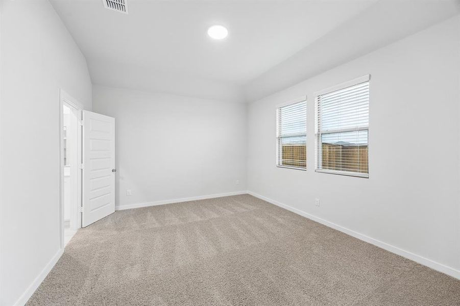 Primary Suite in the Cedar home plan by Trophy Signature Homes – REPRESENTATIVE PHOTO
