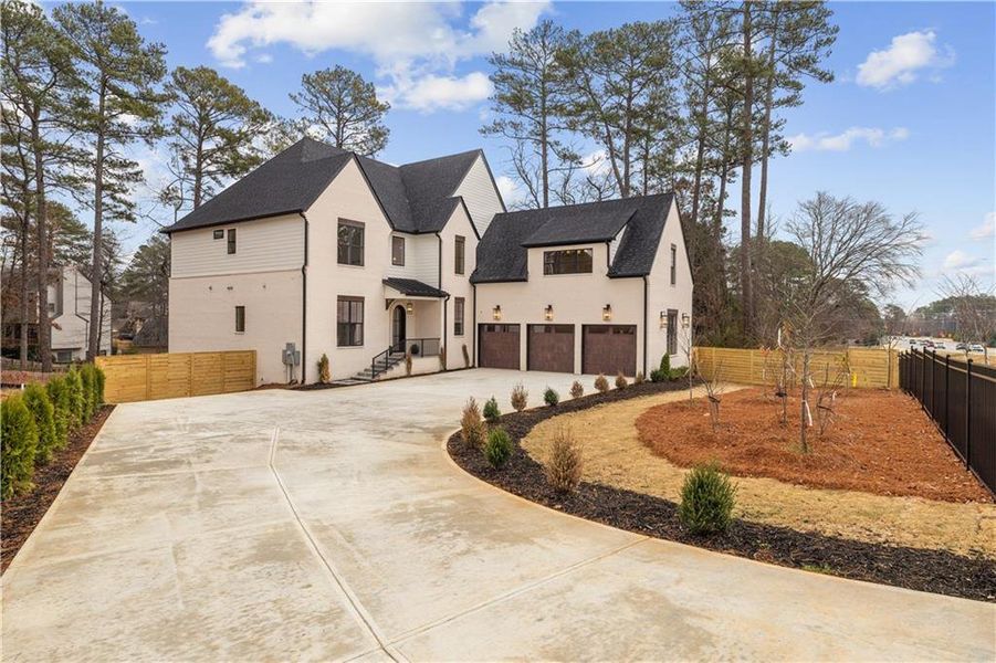 Front exterior of a new home in , Johns Creek, GA, highlighting curb appeal (Image 2).
