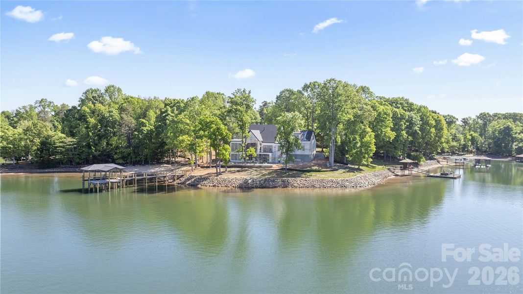 Over 500' of shoreline - New covered dock with lift and private beach area