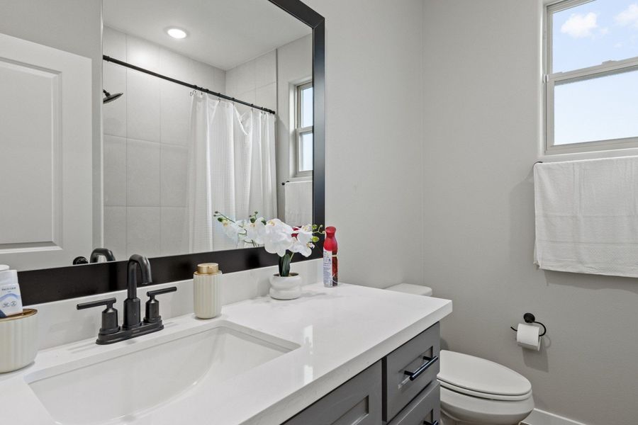 Representative furnished interior of a home built from the Valencia by Hakes Brothers in The Heights at Riverbend II, Brownsville (Image 9).