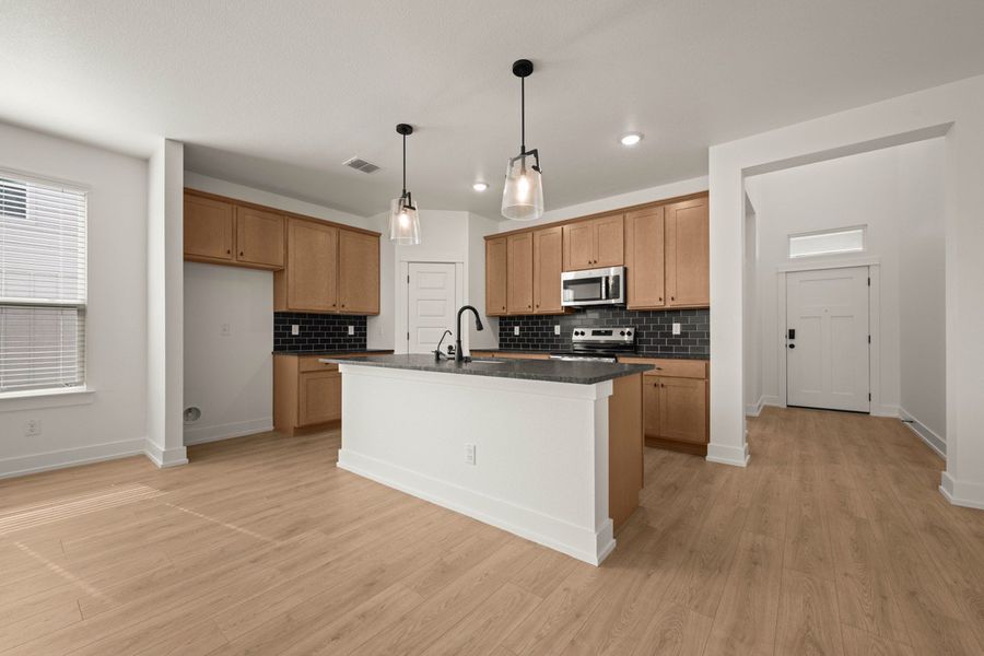 Furnished interior view inside a new home in Rancho San Gabriel, Georgetown (Image 5).