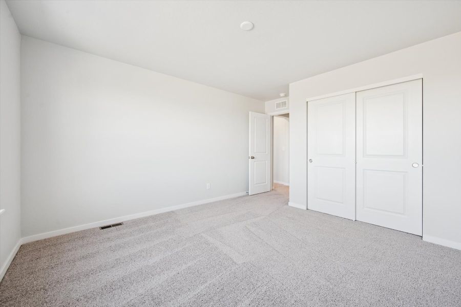 A room with white doors.