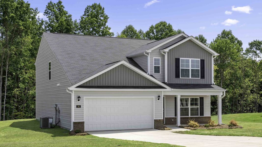 Front exterior of a new home in Bynum Farms, Farmville, NC, highlighting curb appeal (Image 11).