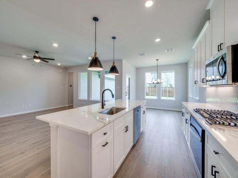 The chef will never be left out of the party in this wonderful open concept design.